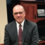 Riley Co. PD Director hospitalized after car, bicycle accident