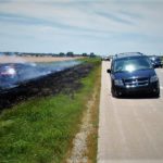 Wheel detaches from van, starts fire