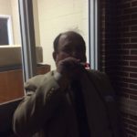 Clarke Sanders lights up victory cigar Thursday night following election of Donald J Trump as President .