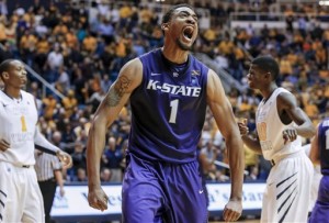 Kansas State’s Shane Southwell (1) reacts after blocking a West Virginia shot in the final second on Saturday. Kansas State defeated West Virginia 65-64. (AP Photo/David Smith)
