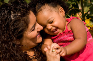 Mom with baby laughing-iStock_000004568169_ExtraSmall