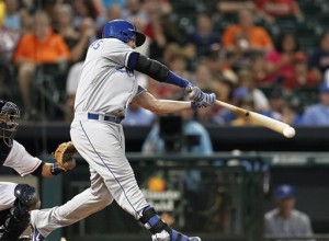 Kansas City Royals third baseman Mike Moustakas (8) lines out to Houston Astros first baseman Chris Carter in the second inning Tuesday in Houston. (AP Photo/Bob Levey)