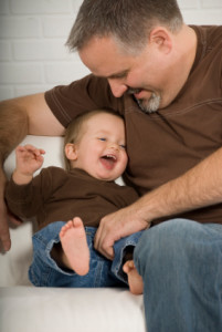 Brown shirt Dad and baby-iStock_000004650929_ExtraSmall
