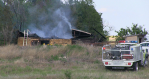 Fire crews respond to a barn fire east of Hays on Tuesday.