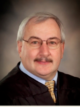 District Magistrate Judge Guy R. Steier