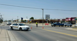 Police on the scene of Monday's bomb threat at Dollar General in Hays