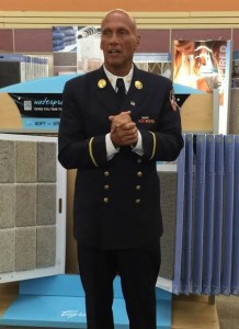 Retired FDNY Battalion Chief Jack Oehm speaks at Sunflower Carpet One in Salina Monday morning about the Stephen Siller Tunnel to Towers Foundation (Photo by Terry Tebrugge/Salina Post)