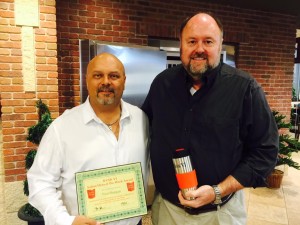 Bank VI President Tom Wilbur presents Paul Morgan with his Hero of the Week award