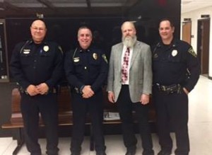 Lt. Gerald Shaft, Master Police Officer Randy Jennings and Capt. Jim Norton retired last week. Pictured with them is Salina Police Chief Brad Nelson (second from left)