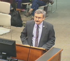 Richard Gehring, co-pastor at Manhattan Mennonite Church, addressed the commission on Tuesday.