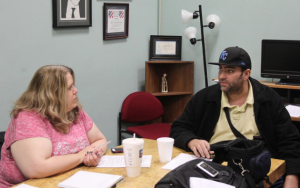 Mary Reynolds, left, worked to get Medicaid coverage for the children of her ex-husband, Andy Rausch, right, while he was hospitalized in July. The complicated applications were approved after four months. ANDY MARSO HEARTLAND HEALTH MONITOR