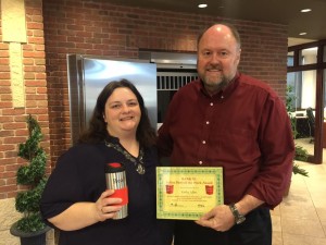 BANK VI President Tom Wilbur presents Kathy Allen with her Hero of the Week award