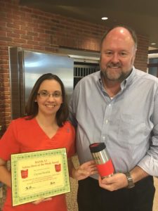 BANK VI President Tom Wilbur presents Crystal Bonilla with her Hero of the Week Award