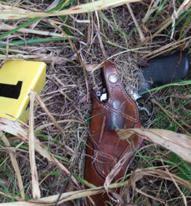 Gun and holster located by the K9- photo KDWP&T Game Wardens