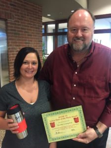 BANK VI President Tom Wilbur presents Heather Livingston with her Hero of the Week Award
